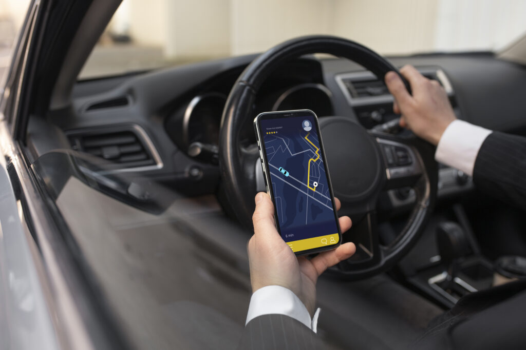 Driver following a navigation app on his phone